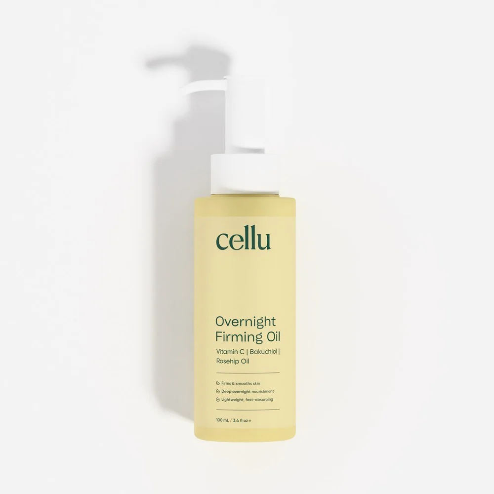 Cellu Overnight Firming Oil, a pale yellow 100 ml pump bottle labeled with vitamin C, bakuchiol, and rosehip oil